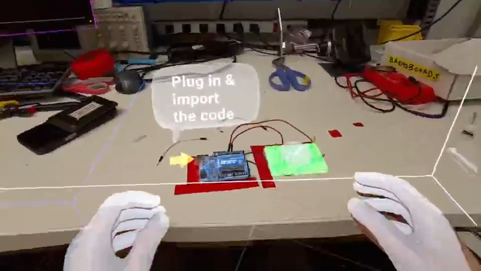 First-person AR prototype view shows hands working with an Arduino circuit and spatial guidance.